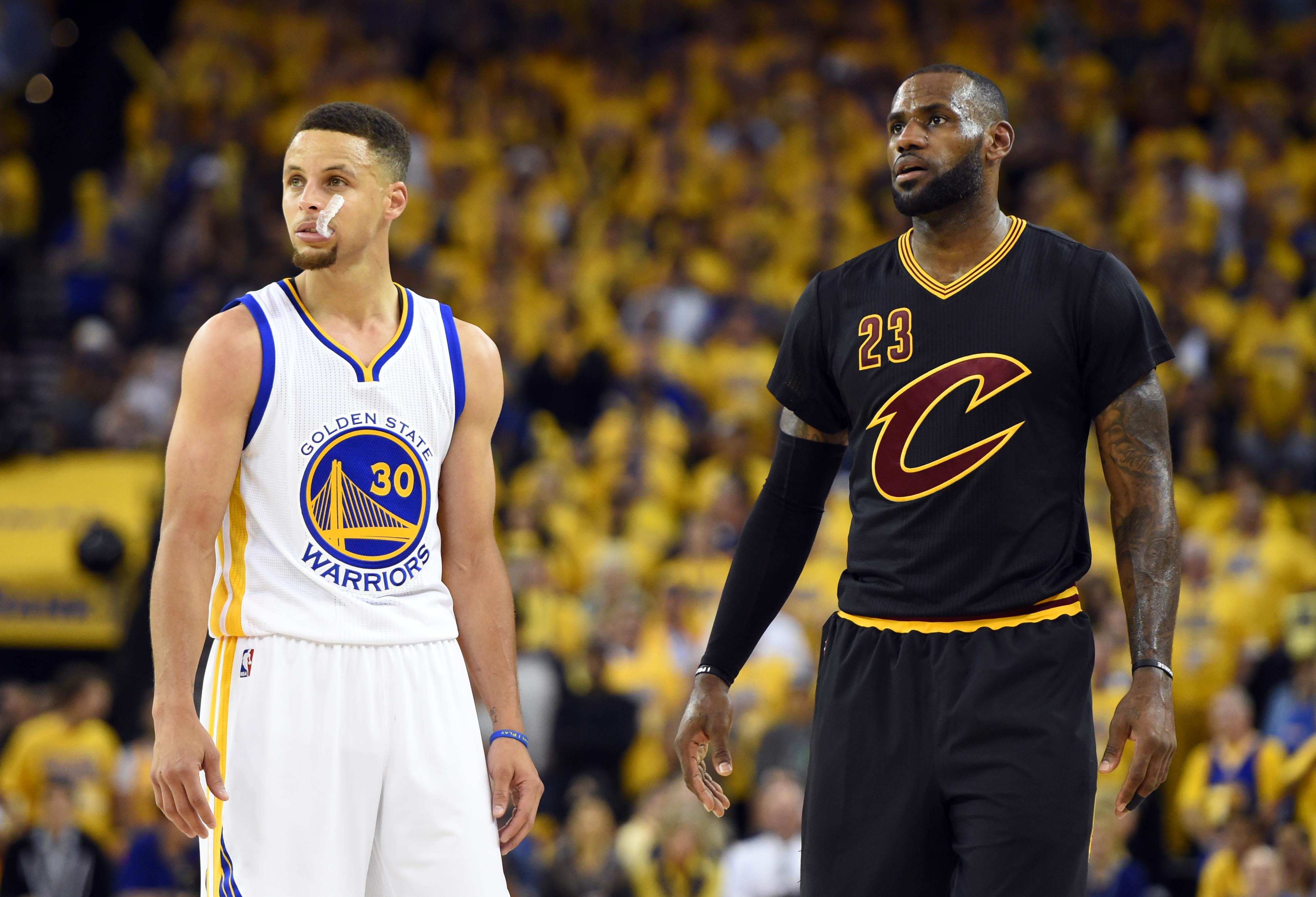 Jun 13, 2016; Oakland, CA, USA; Cleveland Cavaliers forward LeBron James (23) and Golden State Warriors guard Stephen Curry (30) during the third quarter in game five of the NBA Finals at Oracle Arena. Mandatory Credit: Bob Donnan-USA TODAY Sports